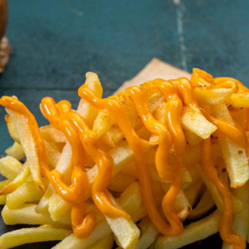 Potatoes with Cheddar Sauce