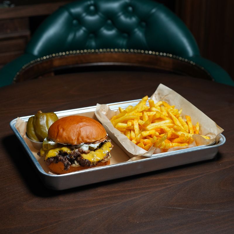 Smash Burger with Truffle Garlic Mayonnaise, Isot Mayonnaise, Double Cheddar, and German Pickle